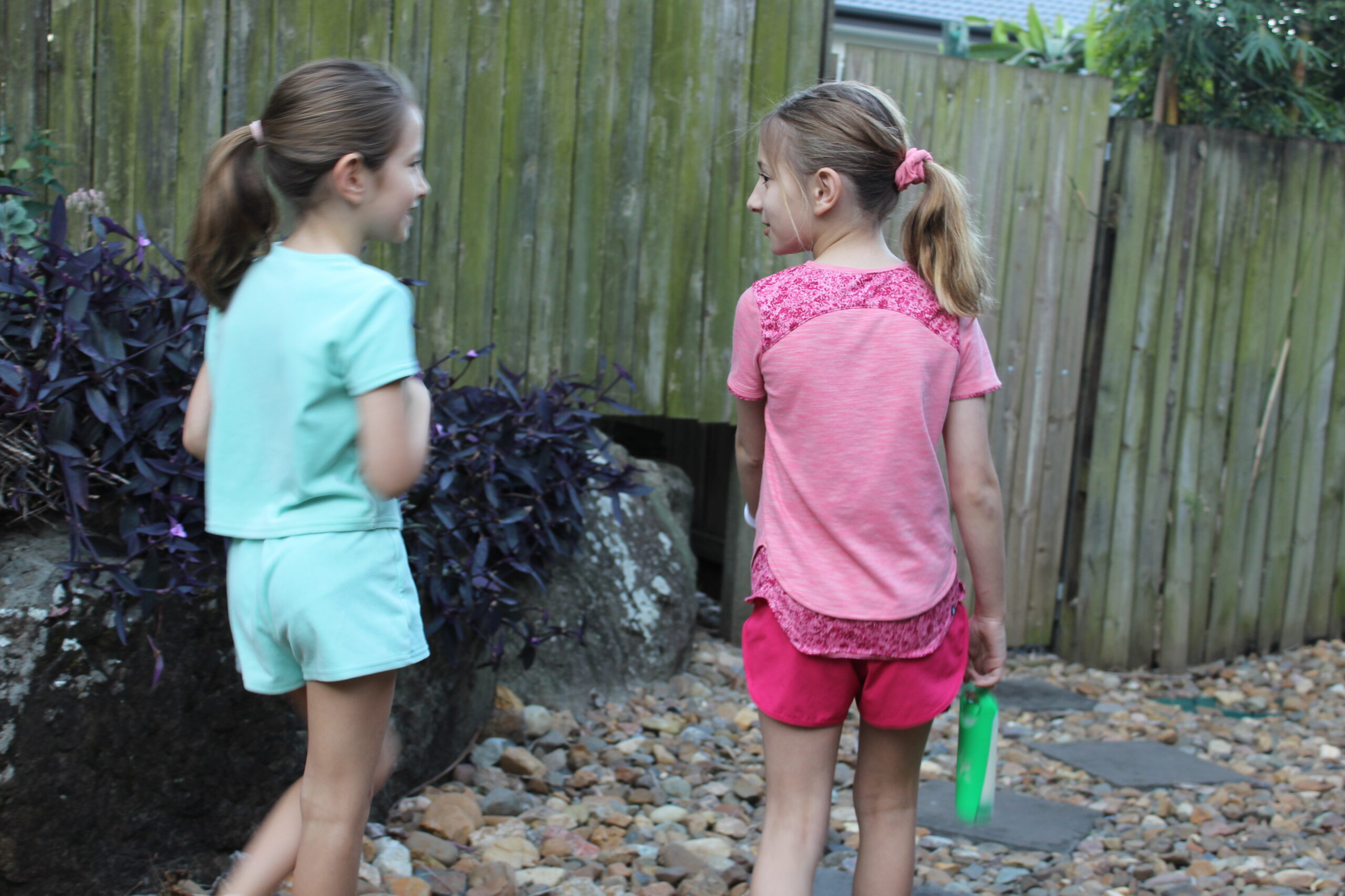 girls walking with koors in hand